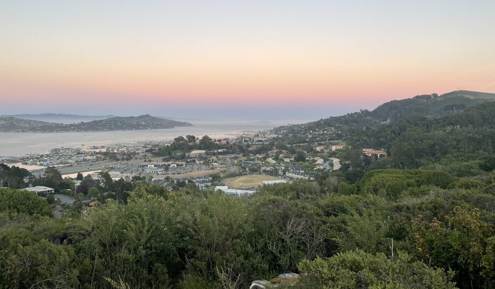 Marin City in the evening, seen from the Alta Trail. County officials say the point of the policy is that residents can ask their local government for help without fear tied to immigration status.