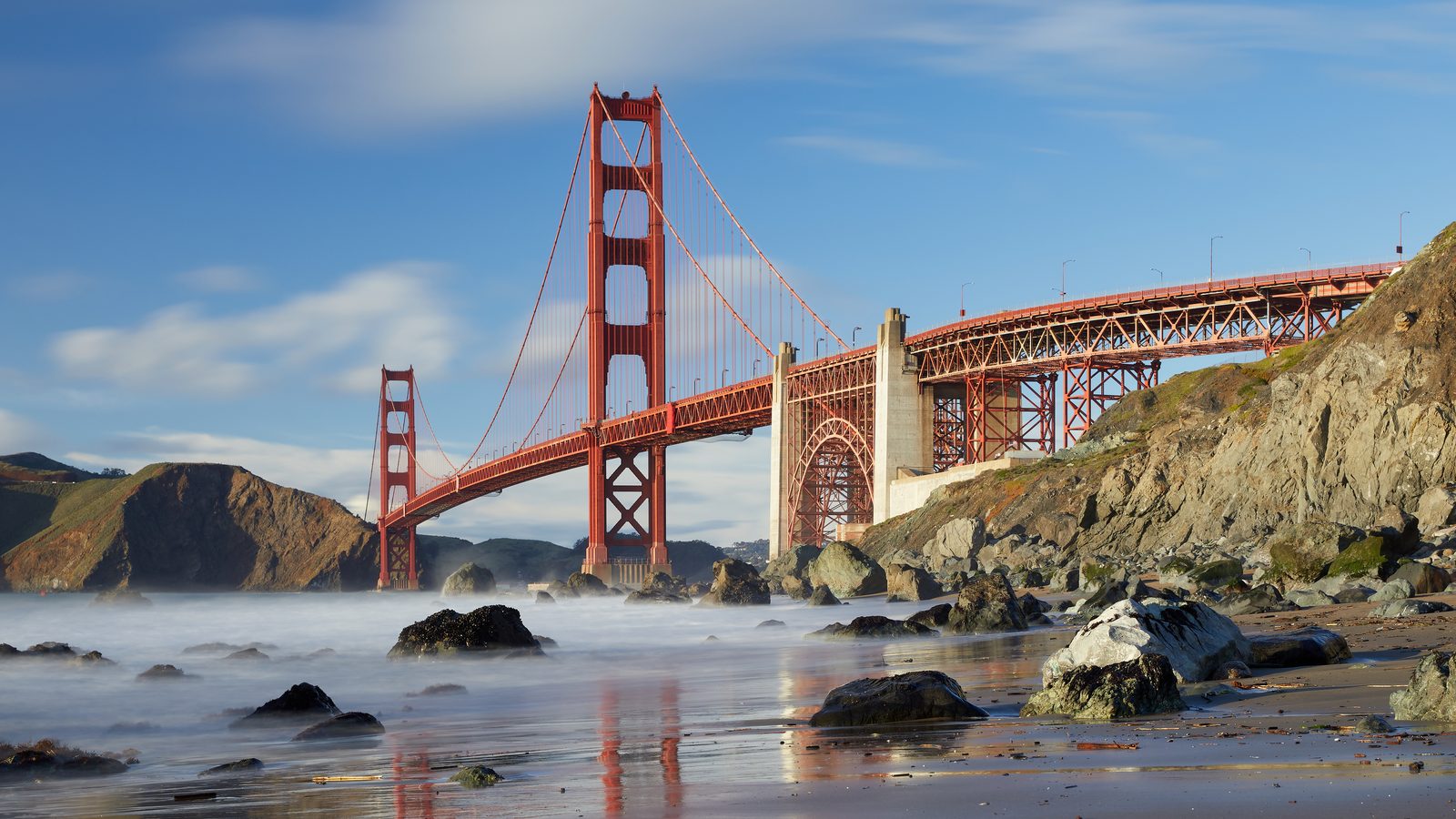 The Golden Gate Bridge from Marshall's Beach. The plan's transit strategies aim to knit the region's dozens of systems into one.