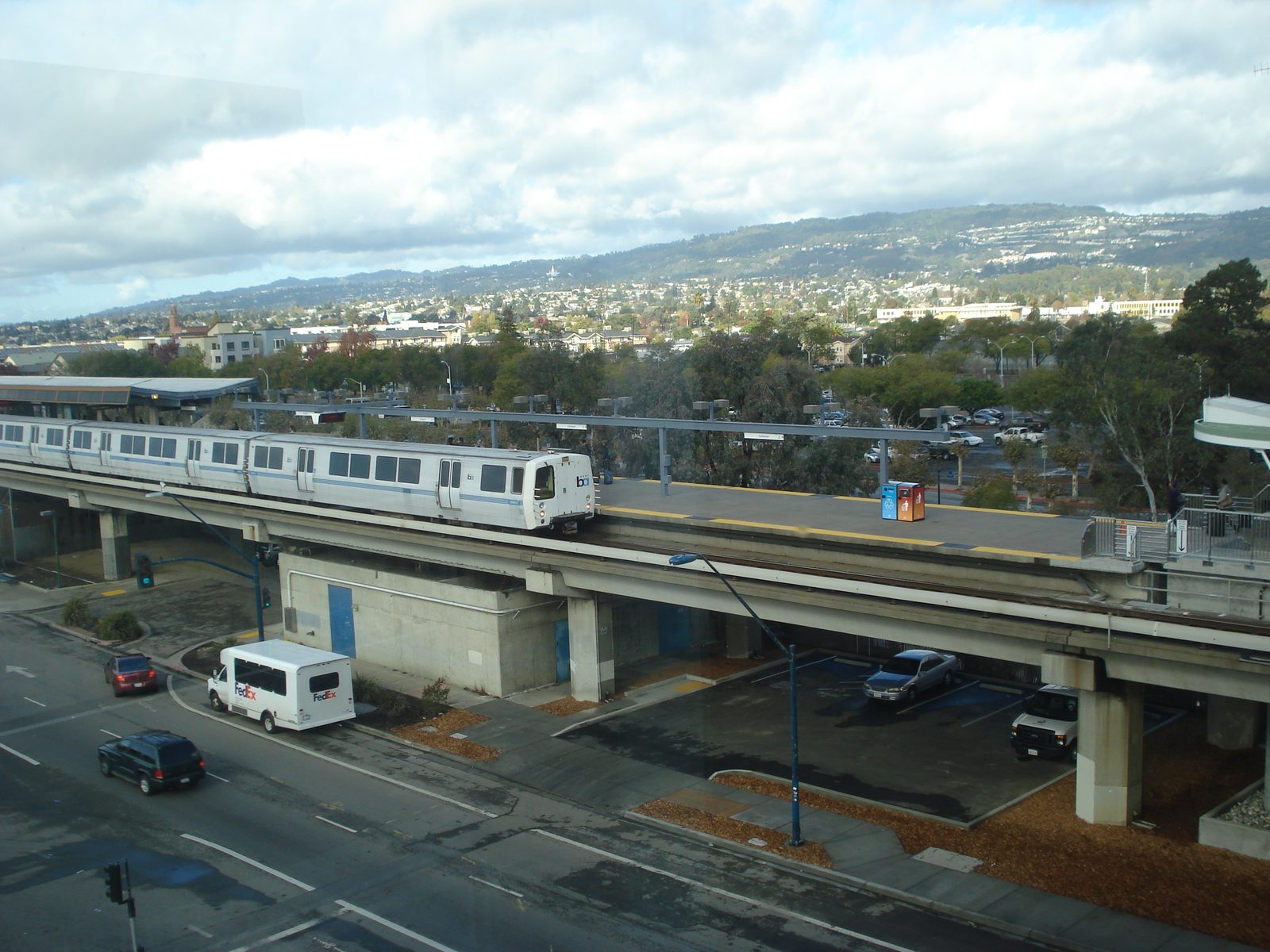 A BART train at Oakland's Coliseum station. Transit 2050+, the plan's companion effort, targets faster, more connected regional service.
