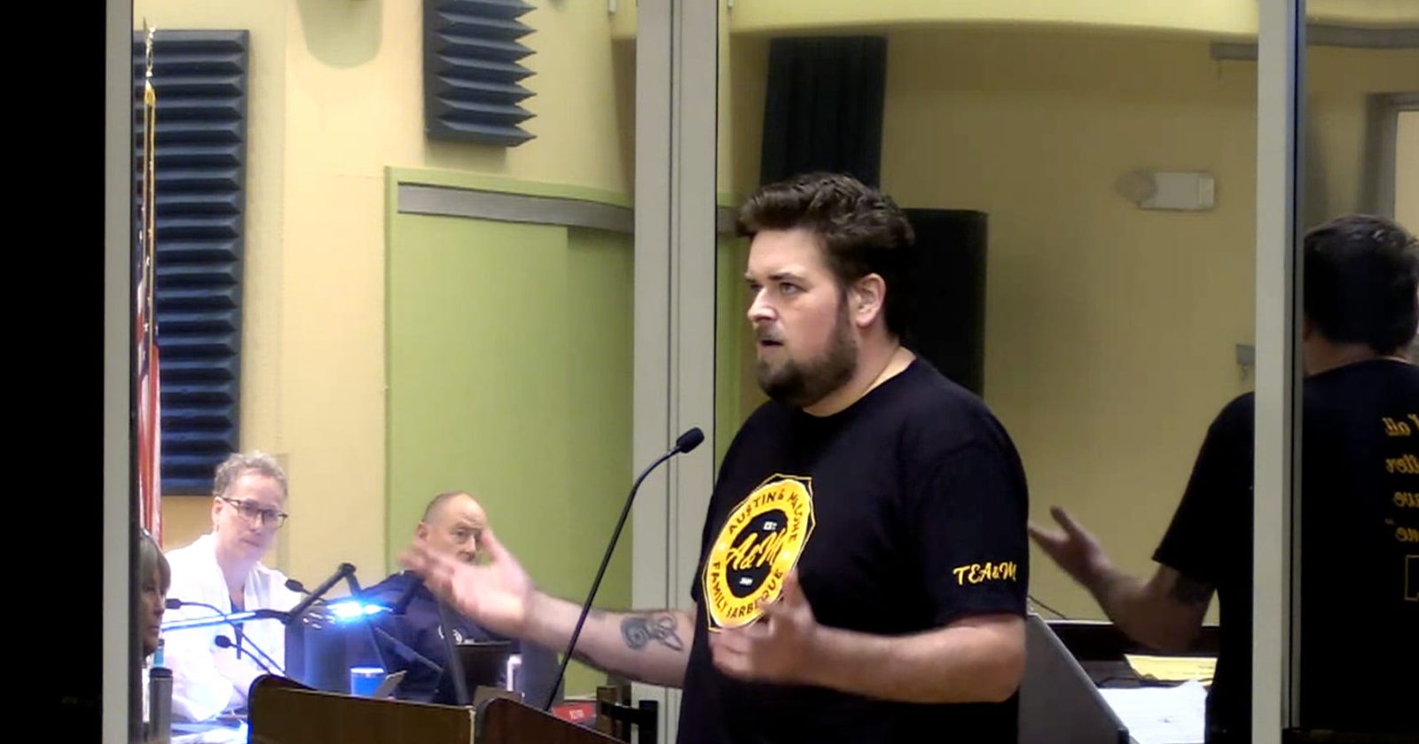 Co-owner Finn Liss addresses the Sebastopol City Council, in a Sebastopol Times image from its meeting coverage. The council voted unanimously on October 6 to leave the zoning in place and resume enforcement.