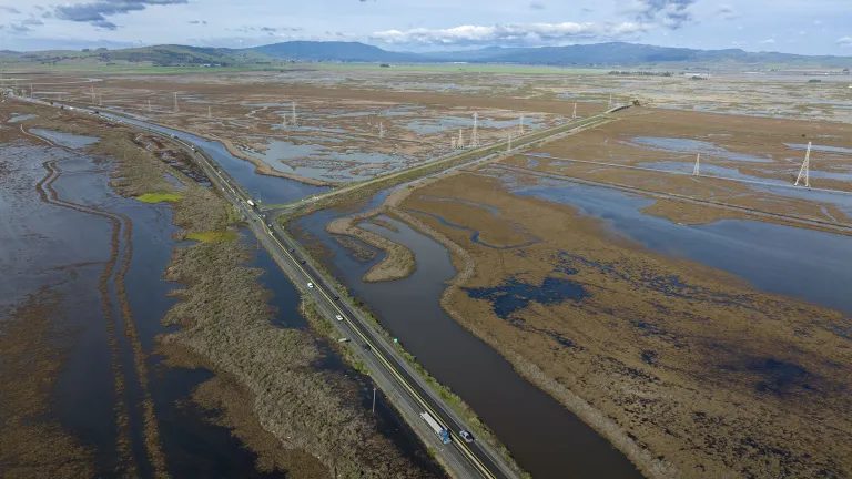 Highway 37 surrounded by floodwater in 2023. The October closure prepares the way to raise portions of the eastbound lanes by three feet, according to Caltrans.
